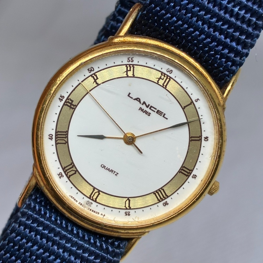 Vintage Lancel Paris Quartz Women Watch Gold Tone Roman Numeral Blue Strap
